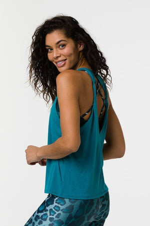 SEA YOGI // Onzie Flow tank in teal left
