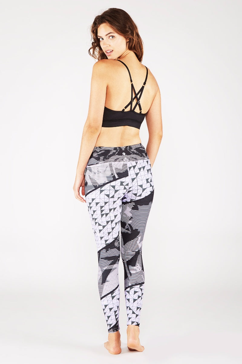 SEA YOGI // Pintuck Bra in Black Sheen colour by Manduka, left-side back image