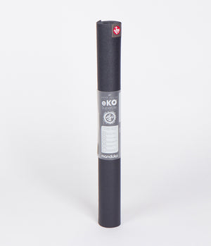 SEA YOGI // eKO Superlite yoga mat in Midnight style, only 1kg in weight by Manduka, standing image
