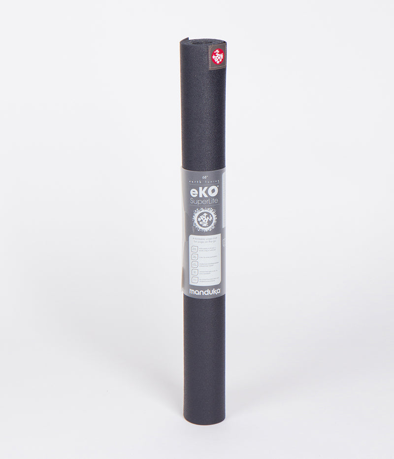 SEA YOGI // eKO Superlite yoga mat in Midnight style, only 1kg in weight by Manduka, standing image