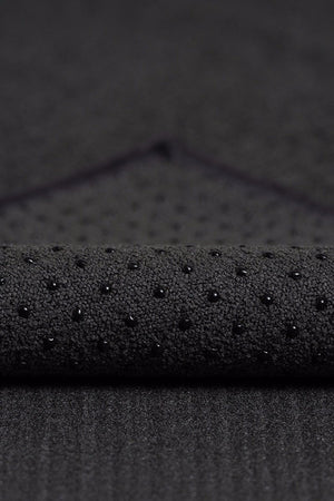 MANDUKA YOGITOES SKIDLESS MAT TOWEL ONYX CLOSE UP FABRIC IMAGE